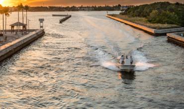 Preview of a boat approaching a dock